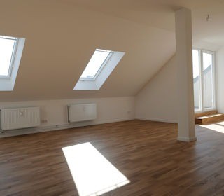 Bei der Modernisierungsprojekt in der Schönhauser Allee/Pappelallee entstanden vier Dachgeschosswohnungen Ausgebautes Dachgeschoss beim Modernisierungsprojekt in der Schönhauser Allee/Pappelallee