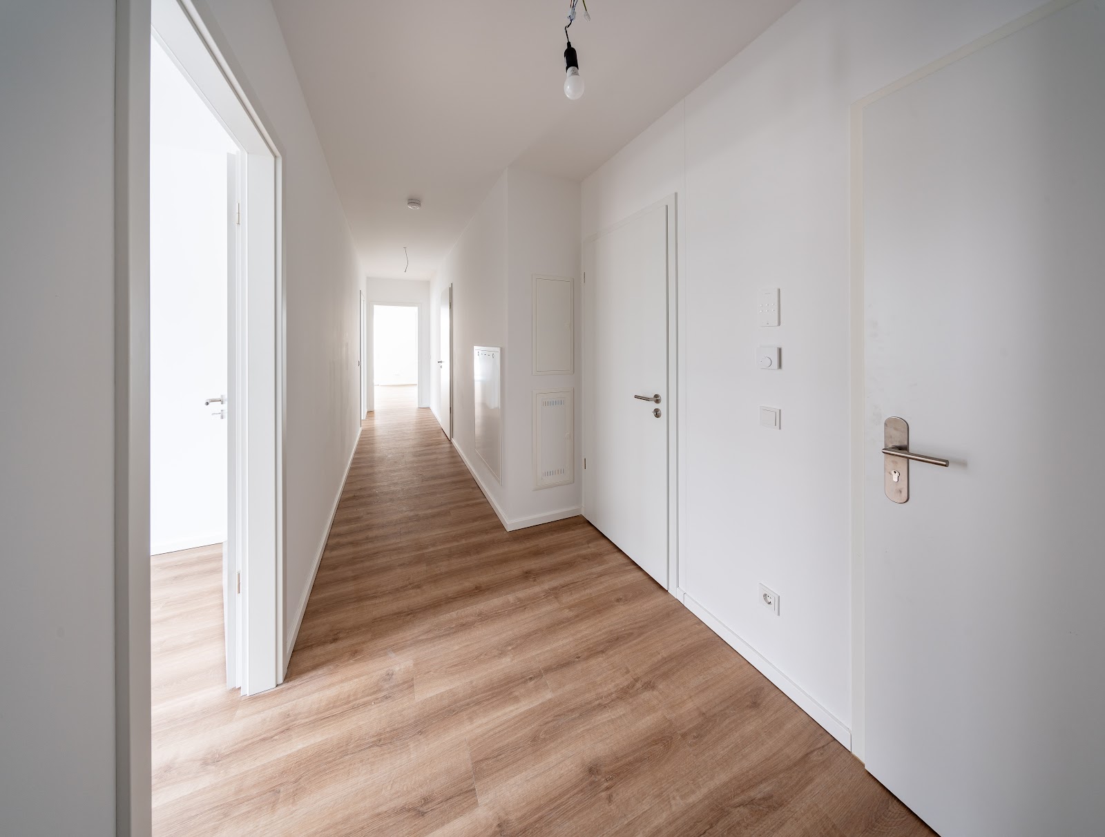 تصویر Nebauwohnung im Erstbezug mit Fußbodenheizung und Balkon / WBS 220 erforderlich
