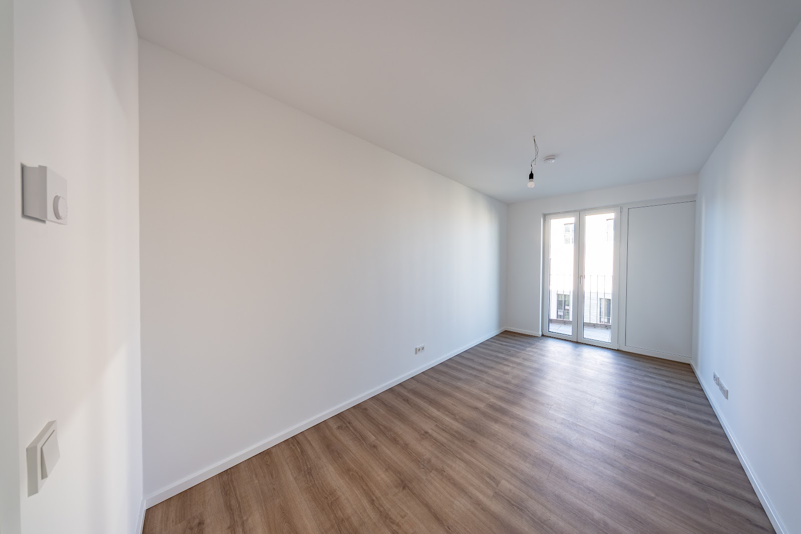 تصویر Neubauwohnung mit Fußbodenheizung und Balkon im Erstbezug / WBS erforderlich