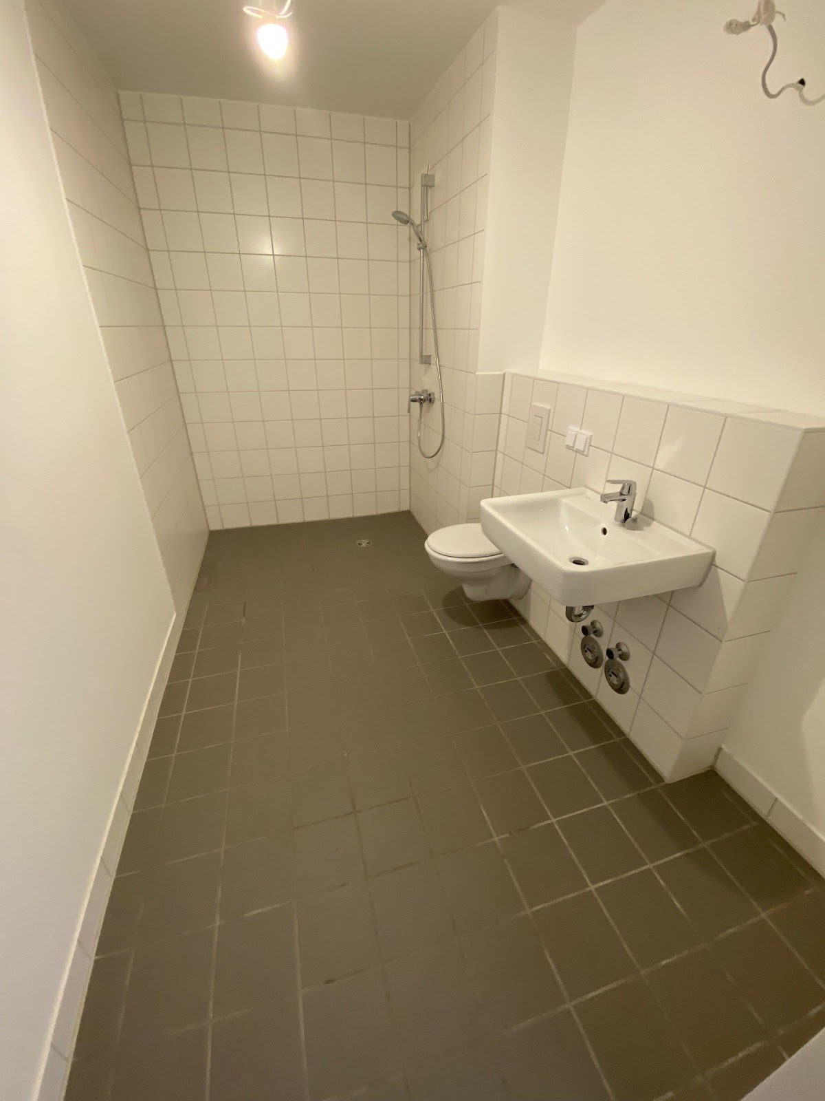 Bad mit bodengleicher Dusche
